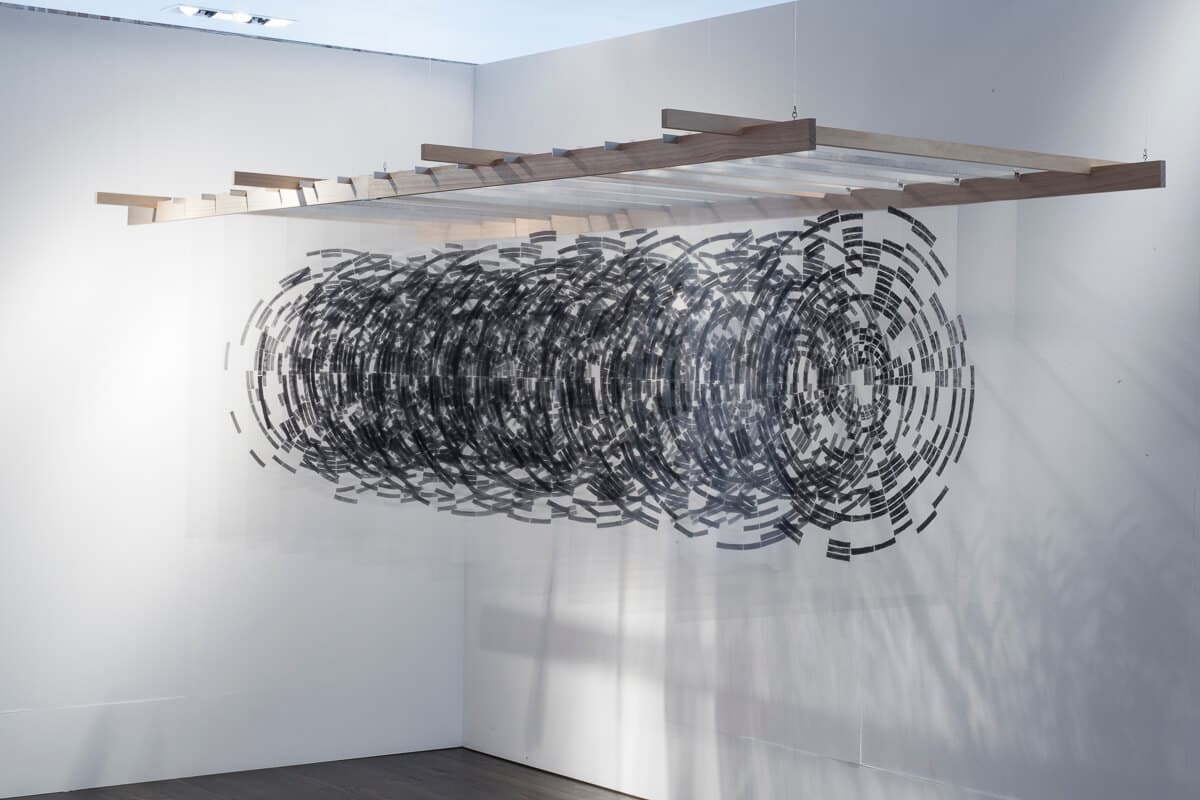 Midway and Counting, 2014 | Transparent photo prints, metal, and wood 46 x 44 x 144 inches